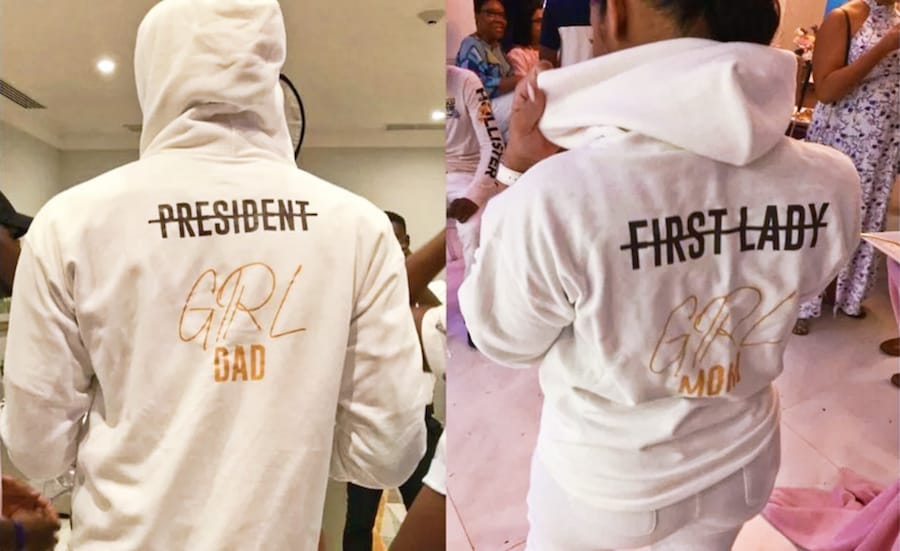 Usain Bolt and girlfriend Kasi Bennett wears matching white hoodies with Girl Dad and Girl Mom prints