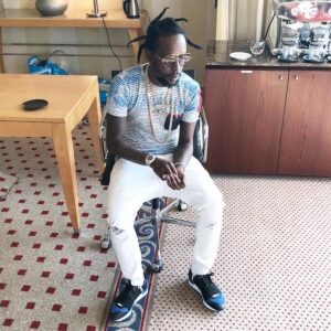 Dancehall artist Popcaan Hairstyle 7