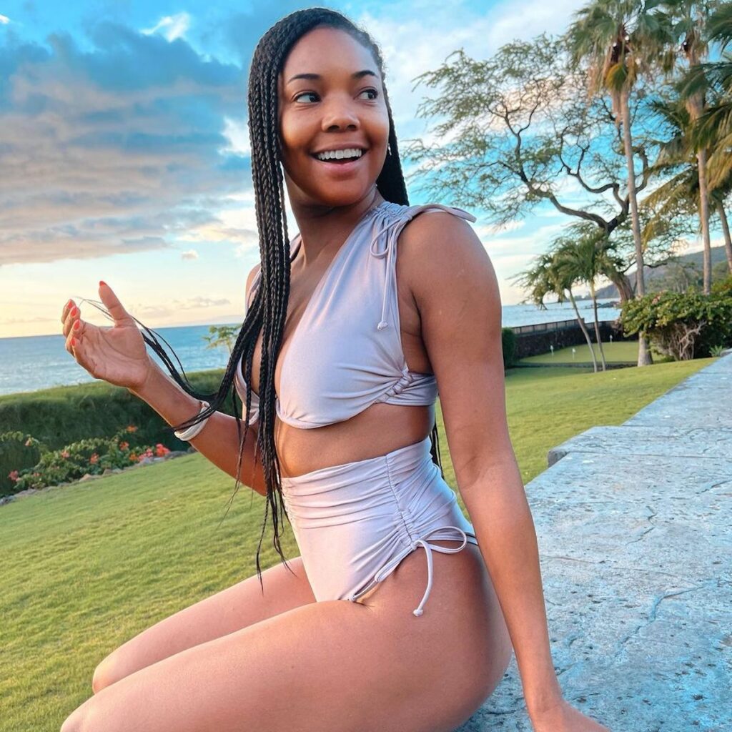 Gabrielle Union Sports Purple Bikini, Enjoys Hawaiian Vacation