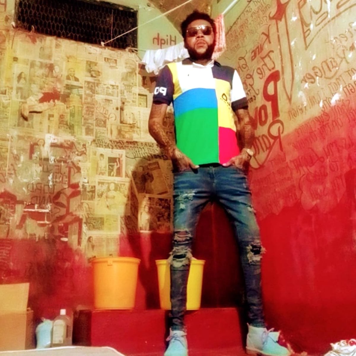 Vybz Kartel Wears Polo Shirt, Skinny Jeans, And Clarks In New Prison Photo